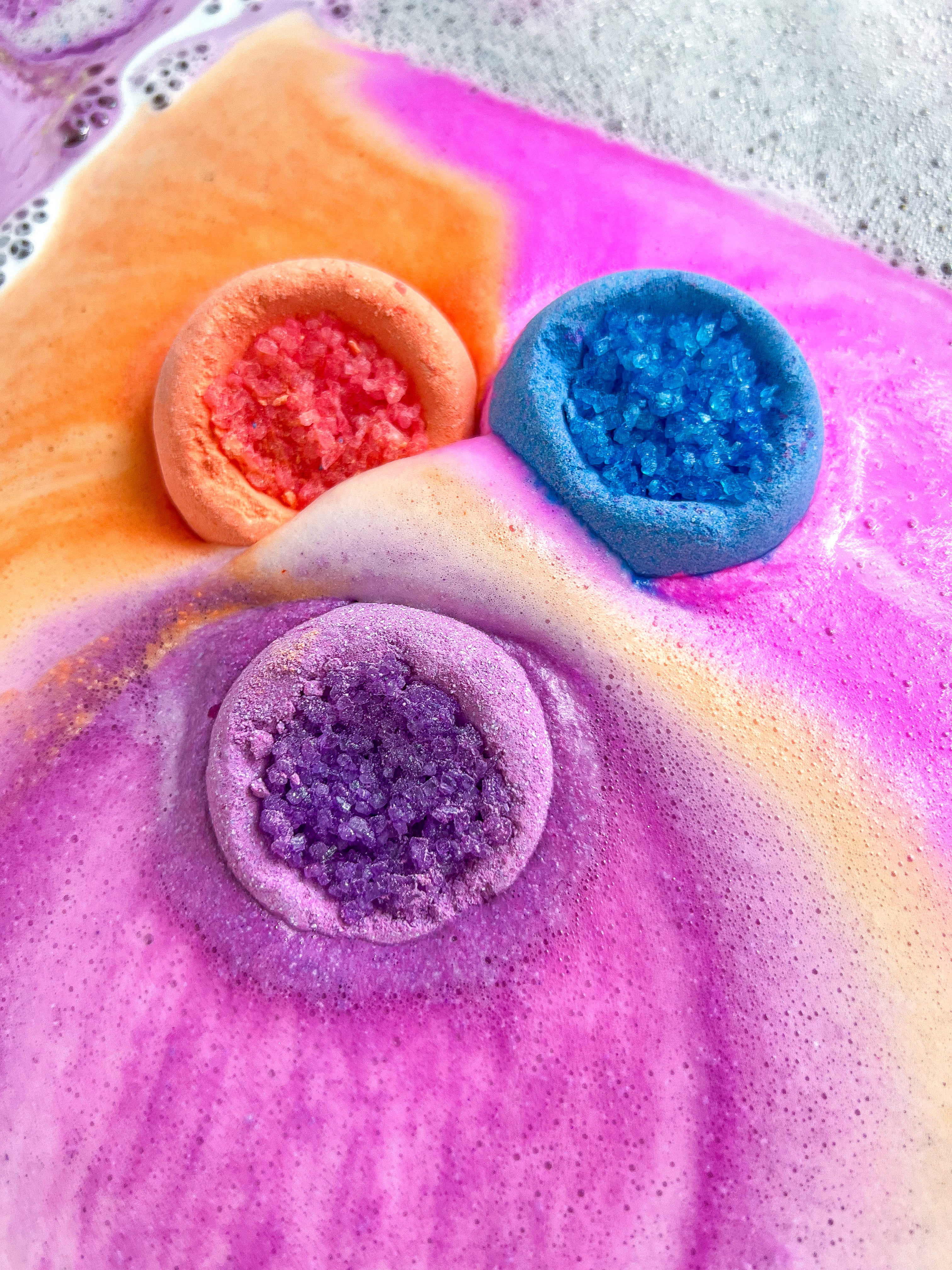 Rainbow space swirl bath bombs