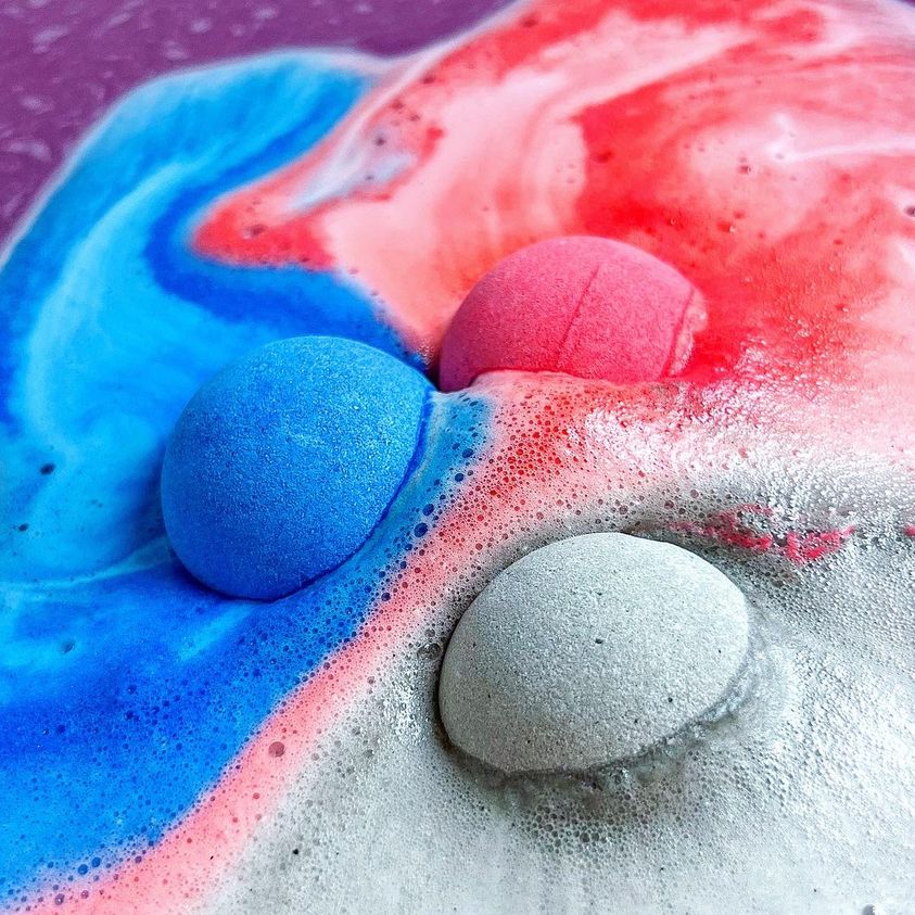 A mix of space coloured galaxy themed bath bomb fragrances